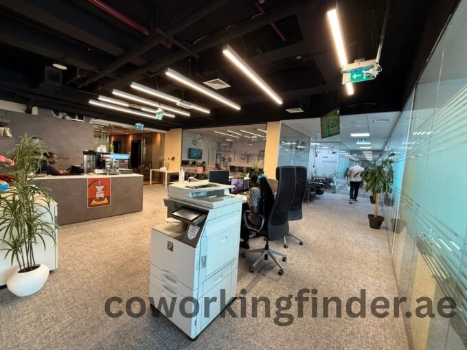 High ceiling coworking office with glass partitions in Dubai