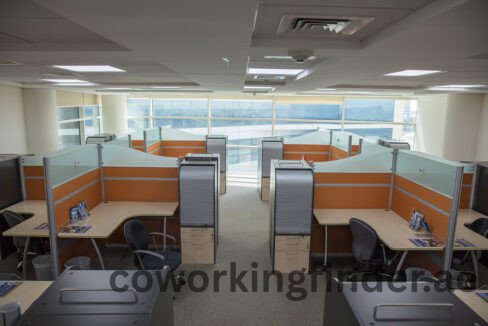 Map location pin over a Downtown Dubai business district